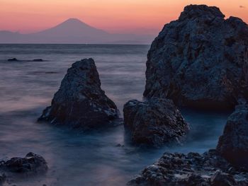 Scenic view of sea at sunset