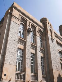 Low angle view of old building against sky