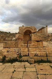 Old ruin building against cloudy sky