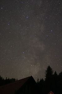 Low angle view of stars against sky at night