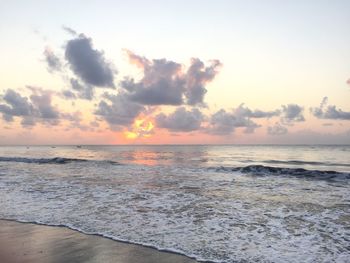 Scenic view of sea against sky at sunset