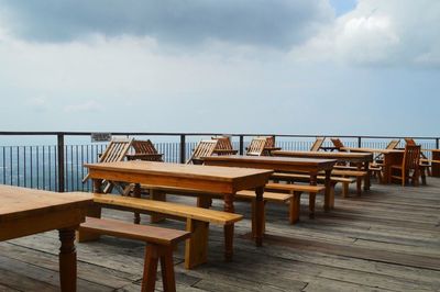 Empty wooden table and chair