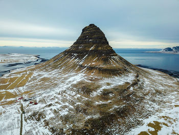 Scenic view of sea against sky during winter