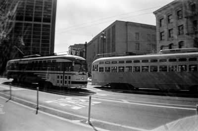 Train on railroad track in city