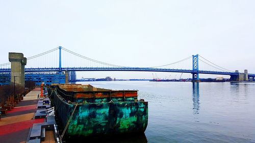 Suspension bridge over river