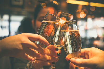 Close-up of woman hand holding wine glass