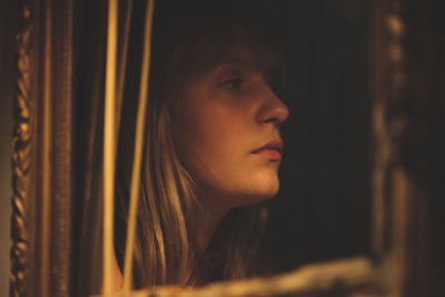 Portrait of young woman looking away