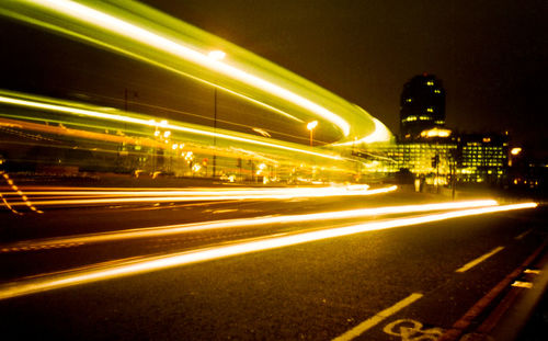 Light trails on city street at night