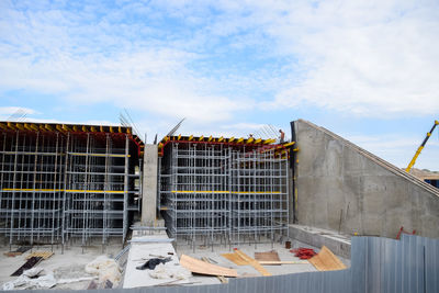 Low angle view of metal structure against sky