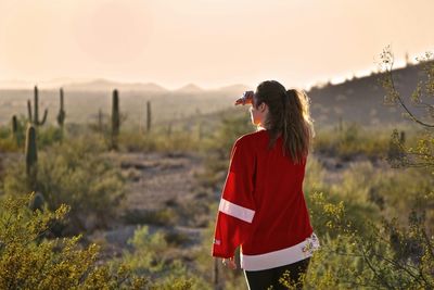 Woman standing on field