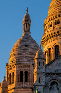 Low angle view of historic building against sky