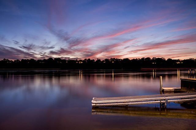 sunset, water, reflection, tranquil scene, tranquility, lake, scenics, sky, beauty in nature, nature, idyllic, silhouette, tree, orange color, pier, calm, cloud - sky, cloud, river, outdoors