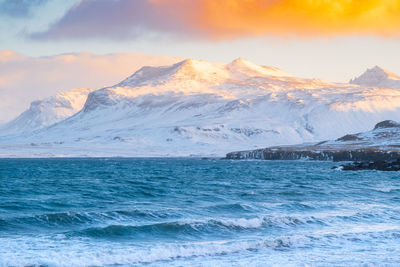 Scenic view of sea against sky during sunset