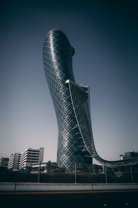 Low angle view of skyscrapers against clear sky