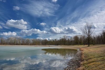 View of lake against cloudy sky