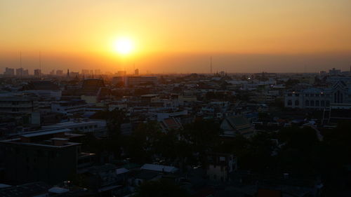 High angle view of townscape against sky during sunset