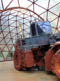 Old rusty car in park