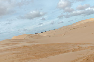 Scenic view of desert against sky