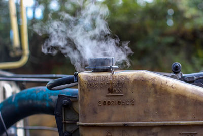 Close-up of steam emitting from machine