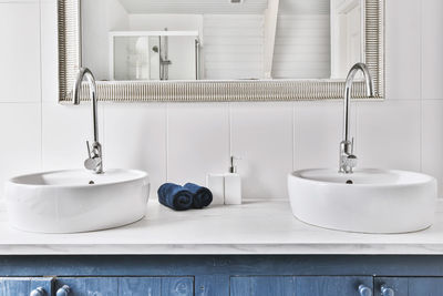 Close-up of faucet in bathroom at home