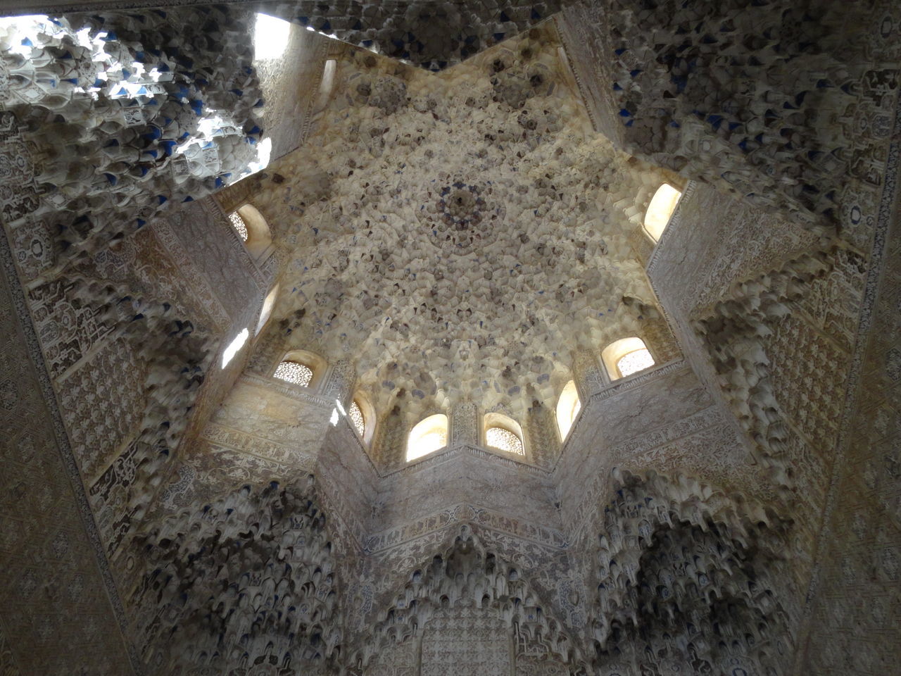 LOW ANGLE VIEW OF ILLUMINATED CHANDELIER