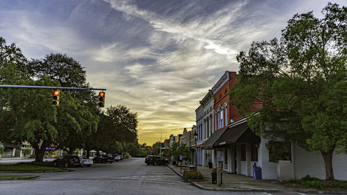 Street amidst buildings against sky