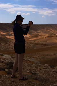 Woman standing on beach