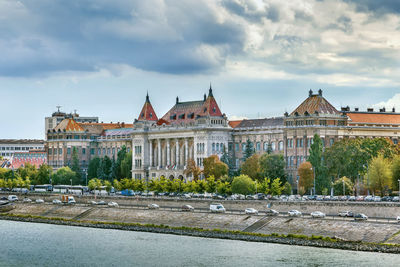 View of building of budapest university of technology and economics from danube, hungary