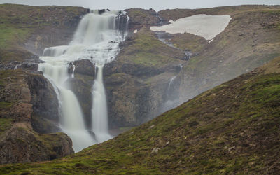 Rjukandafoss waterfalls are impressively big and go hike to get up closer during an icelandic summer