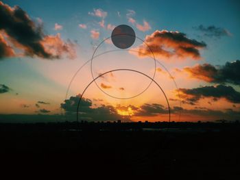 Scenic view of landscape at sunset