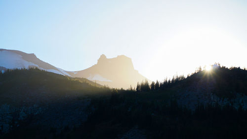 Scenic view of silhouette mountains against clear sky