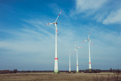 Wind turbines on field