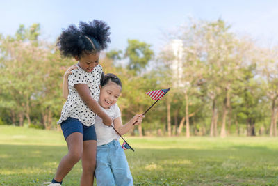 Mother and daughter on field