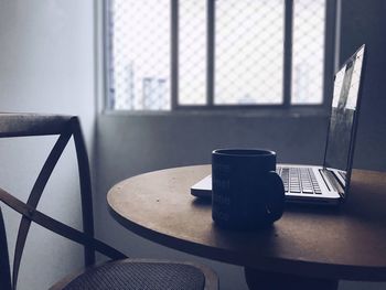 Close-up of laptop on table
