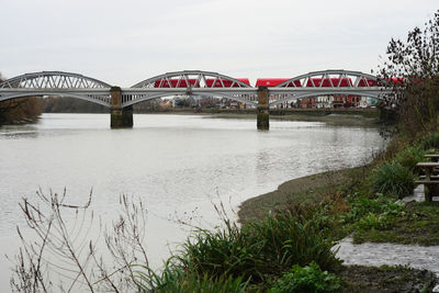 Bridge over river against sky