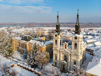 High angle view of buildings in city against sky