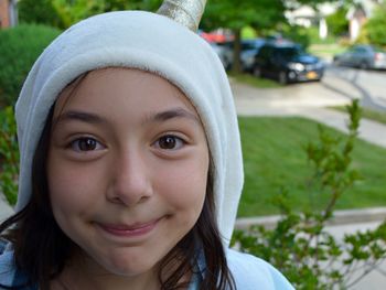 Close-up portrait of smiling girl