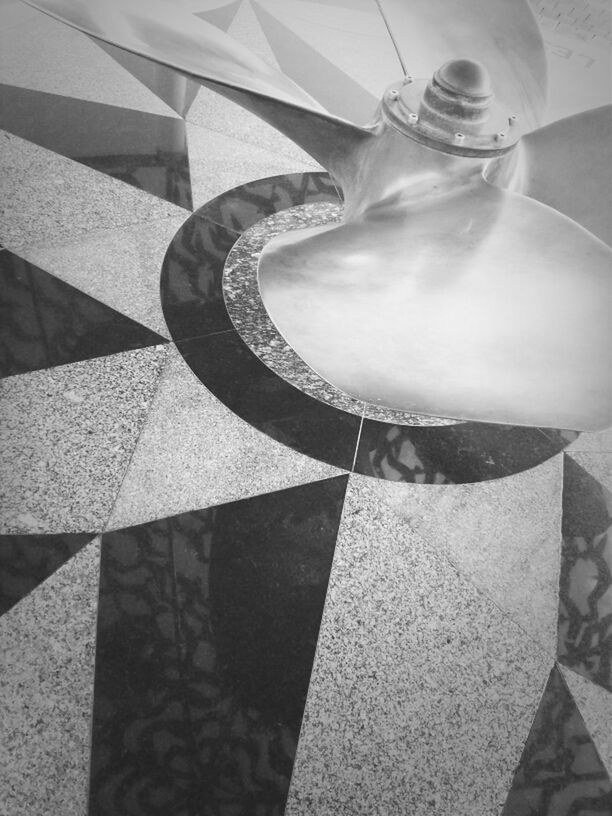 indoors, high angle view, pattern, art and craft, creativity, close-up, art, design, shadow, still life, sunlight, no people, table, decoration, craft, day, shape, tiled floor, striped, fabric