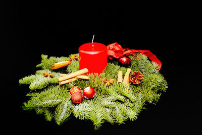 Close-up of christmas decoration against black background