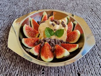 High angle view of fruits in bowl on table