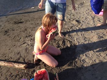 Low section of children on beach