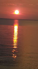 View of calm sea at sunset