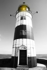 Low angle view of lighthouse against sky