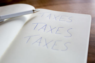 Taxes written in book