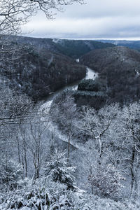 Aerial view of landscape against sky during winter