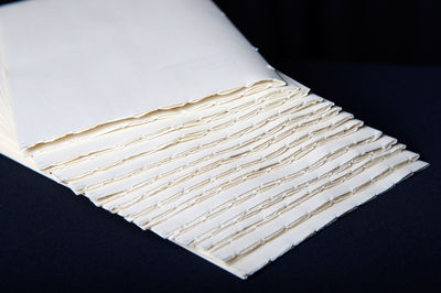 High angle view of bread on table against black background
