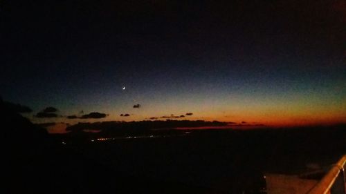 Scenic view of sea against sky at night