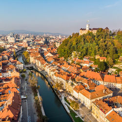 High angle view of river amidst buildings in town