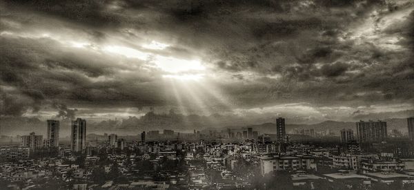 High angle view of buildings against sky in city