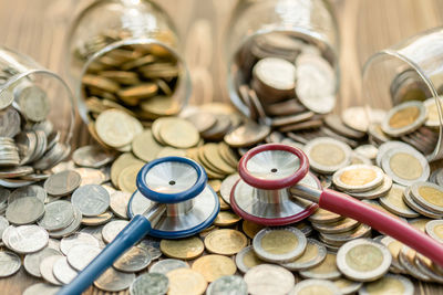 High angle view of coins in container